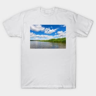 Blue cloudy summer sky over Bug river, Poland, Europe T-Shirt